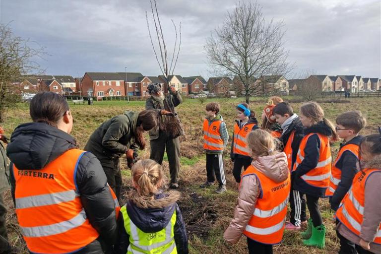 Pye Green Academy pupils learning how to plant trees