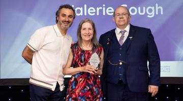 Martin Rogerson presenting the Unpaid Carer award to Valerie G small