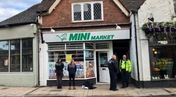 Lichfield shop with police outside