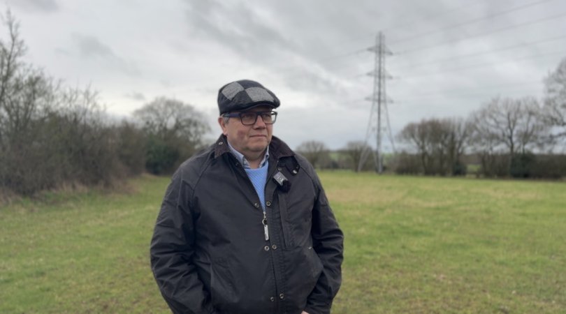 Image shows Andrew Mynors in a field.