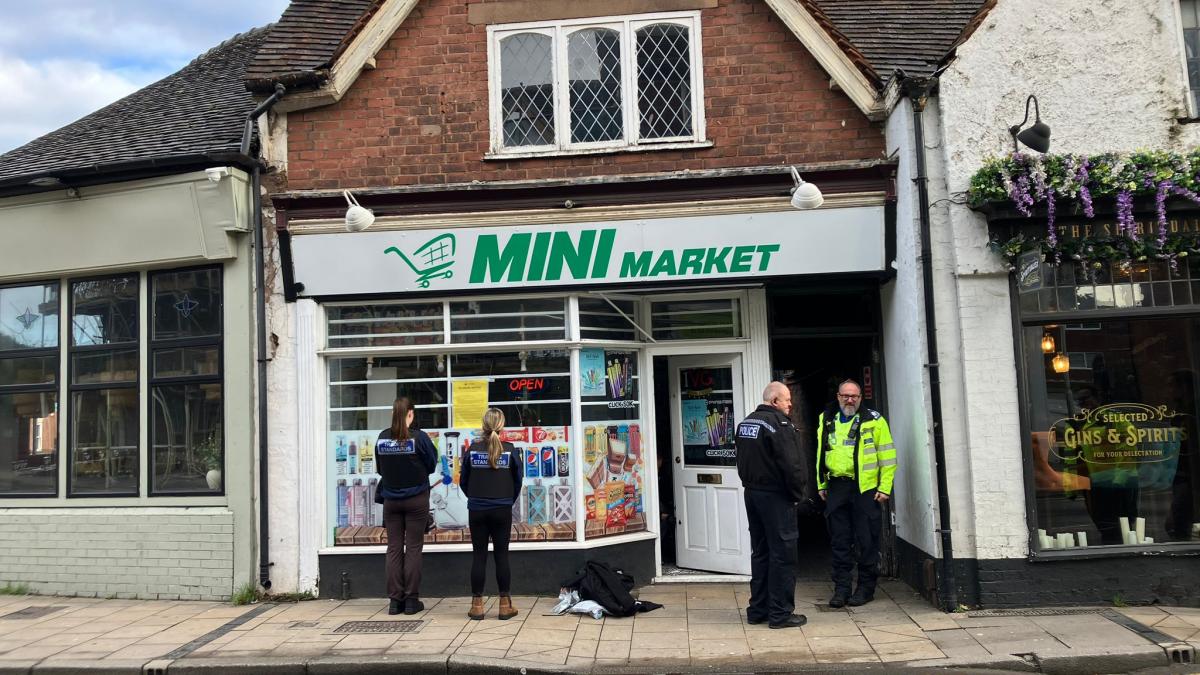 Lichfield shop with police outside