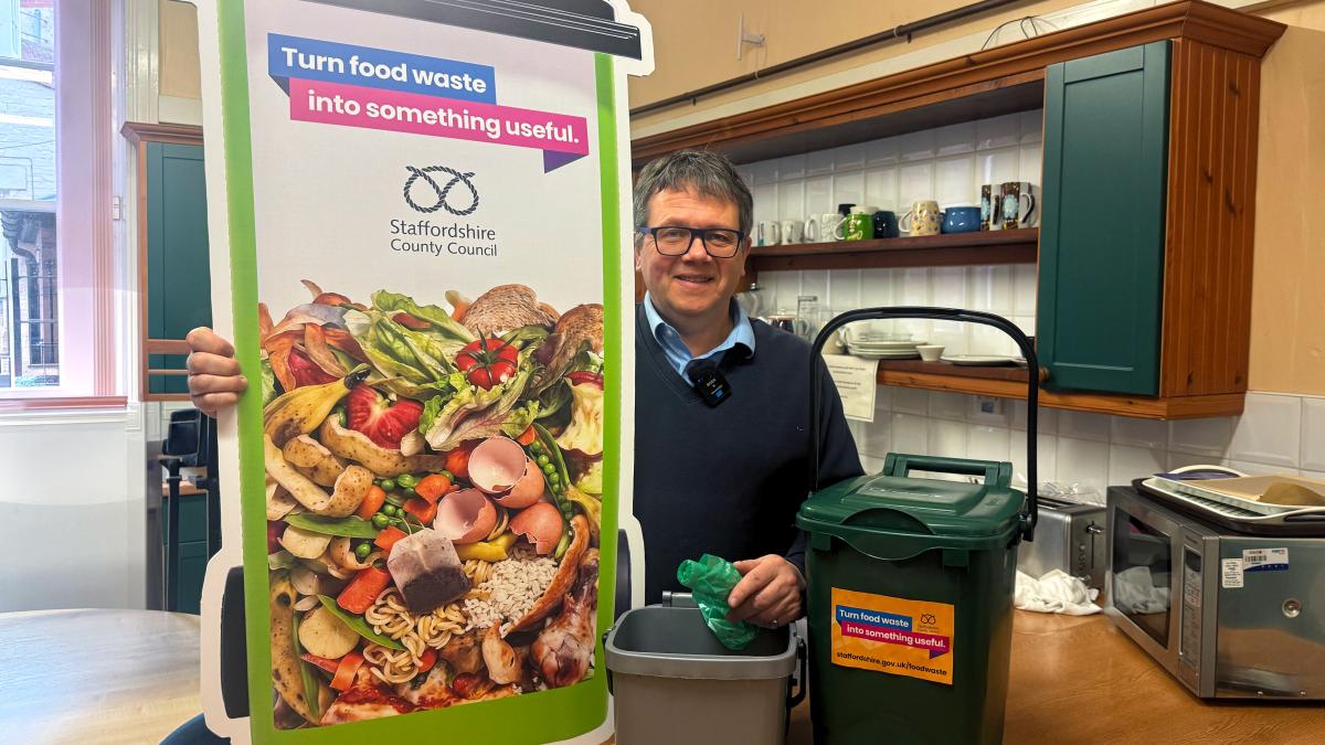 Councillor Mynors with food caddies
