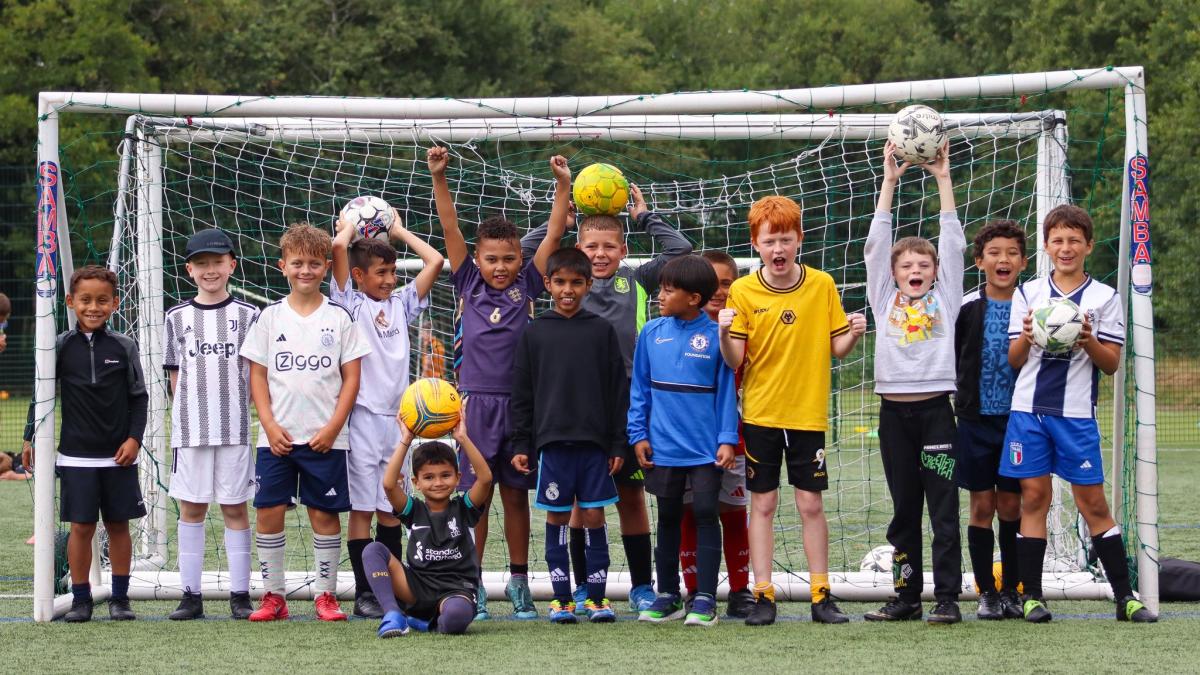 children playing football